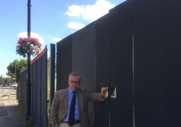 Michael Gove at the Guildford Road site in Lightwater
